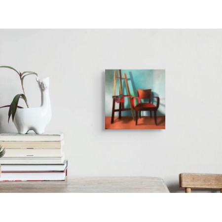 Artiste peintre Laëtitia Giraud : chaise et chevalet vides, lumière et couleurs chaudes suspendent le temps