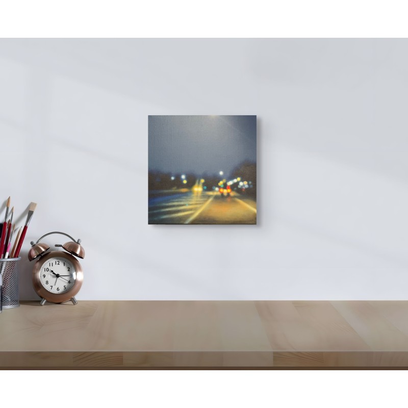 Œuvre de l’artiste Laëtitia Giraud, des lumières des phares des voitures sur l’autoroute nocturne, sur un mur blanc