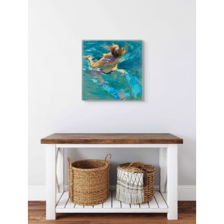Painting of woman swimming in blue water by Monica Castanys on interior wall
