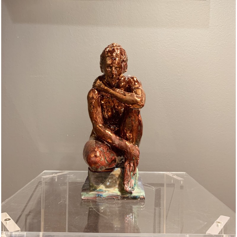 Seated woman by Maurizio Mastromatteo