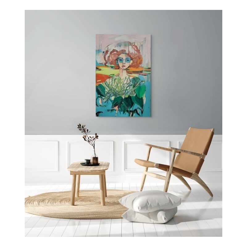 Œuvre originale de GOLNAZ AFRAZ, peinture d'un portrait expressive et colorée, accrochée sur mur blanc.