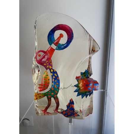 Sculpture de verre contemporain représentant un visage imaginaire aux couleurs vives vu de profil.
